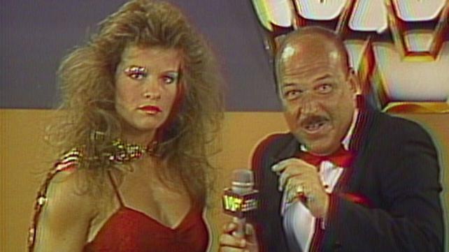 mean gene okerlund laughing during a promo